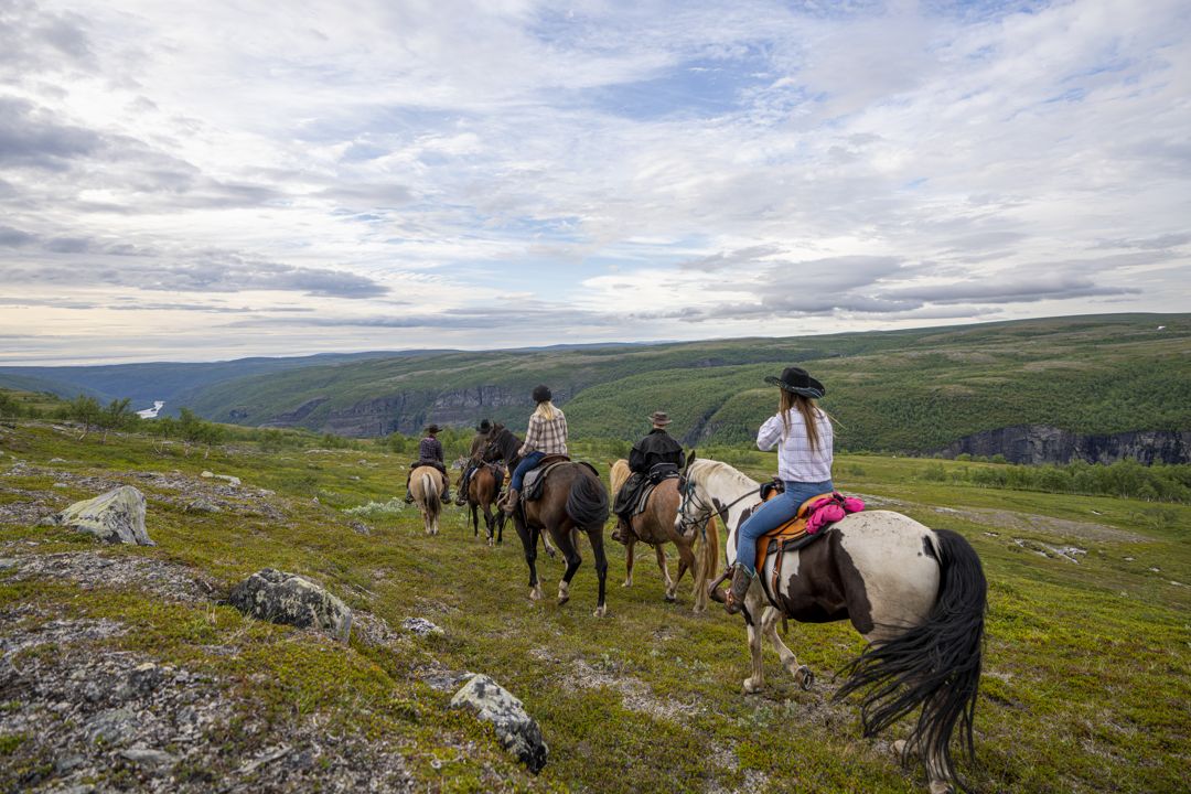 Riders following a trail across the plateau